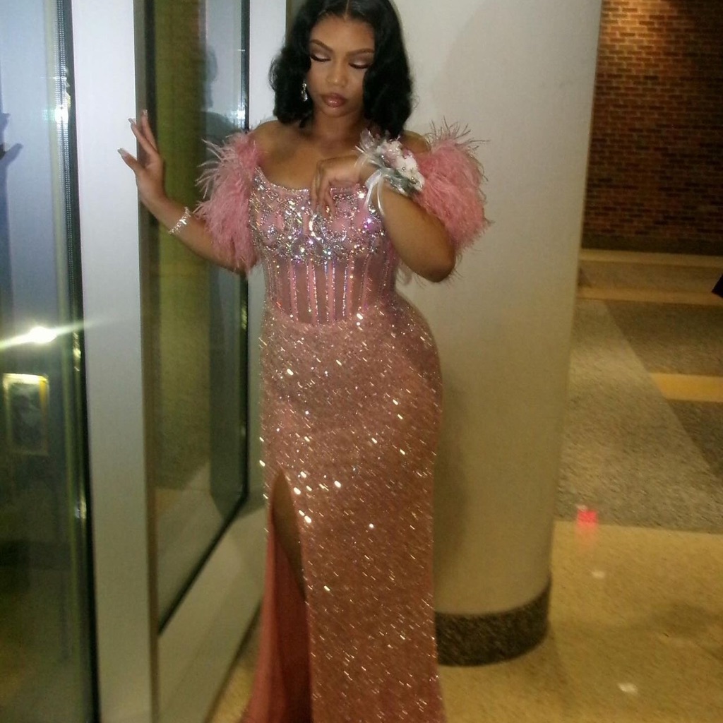 Elegant Pink Feathered Evening Gown